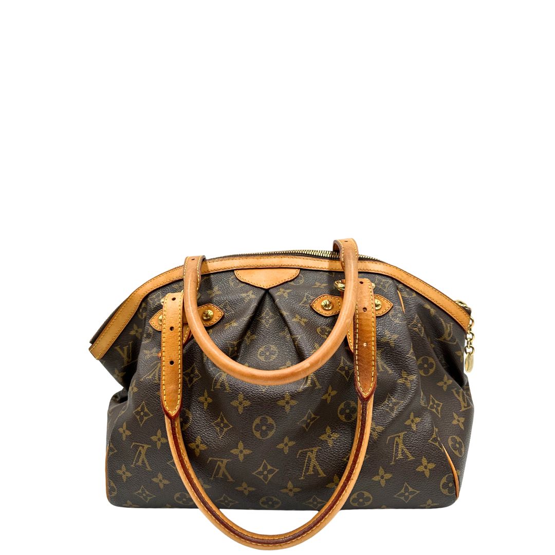 retro  Borsa Louis Vuitton in canvas marrone monogram con finiture in vacchetta naturale e parti metalliche dorate; munita di doppi manici regolabile, da portare a mano o a spalla. Dotata di dustbag, di lusso, originale, ottime condizioni, usata. 