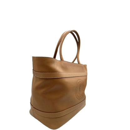 lato Borsa Saint Laurent in pelle beige con logo Rive Gauche sul front; munita di doppi manici, indossabile a spalla. Completa di dustbag, di lusso, originale, ottime condizioni, usata. 