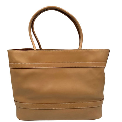 retro  Borsa Saint Laurent in pelle beige con logo Rive Gauche sul front; munita di doppi manici, indossabile a spalla. Completa di dustbag, di lusso, originale, ottime condizioni, usata. 