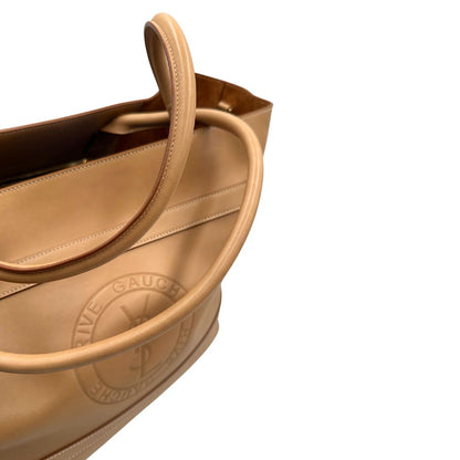 manici  Borsa Saint Laurent in pelle beige con logo Rive Gauche sul front; munita di doppi manici, indossabile a spalla. Completa di dustbag, di lusso, originale, ottime condizioni, usata.