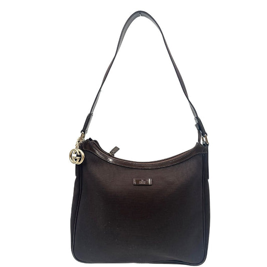 front  Borsa Gucci in tessuto marrone con finiture in pelle tono su tono e parti metalliche dorate; munita di un manico singolo, indossabile a spalla. Completa di dustbag, di lusso, originale, eccellenti condizioni, usata. 