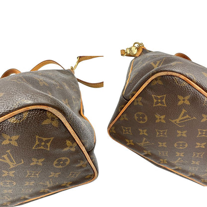 angoli Borsa Louis Vuitton in canvas marrone monogram con parti metalliche dorate e finiture in vacchetta naturale; munita di una tracolla amovibile e regolabile e doppi manici. Indossabile a spalla oppure a mano. Completa di dustbag, di lusso, originale, ottime condizioni, usata.