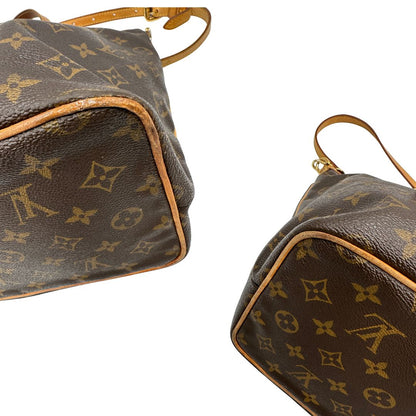 angoli Borsa Louis Vuitton in canvas marrone monogram con parti metalliche dorate e finiture in vacchetta naturale; munita di una tracolla amovibile e regolabile e doppi manici. Indossabile a spalla oppure a mano. Completa di dustbag, di lusso, originale, ottime condizioni, usata.