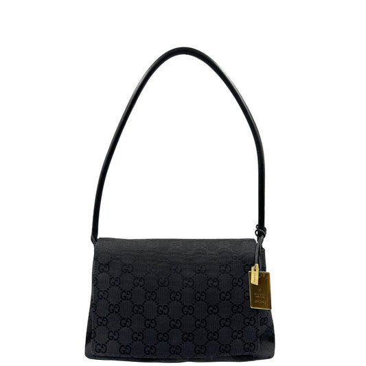 front  Borsa Gucci in tessuto GG nero con finiture in pelle tono su tono e parti metalliche dorate; munita di un manico singolo arrotondato e una pochette interna, di lusso, originale, ottime condizioni, usata. 