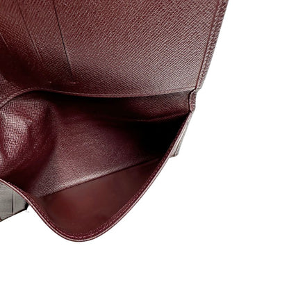 interno  Portafoglio Louis Vuitton in pelle bordeaux. Completo di dustbag, di lusso, originale, ottime condizioni, usato. 