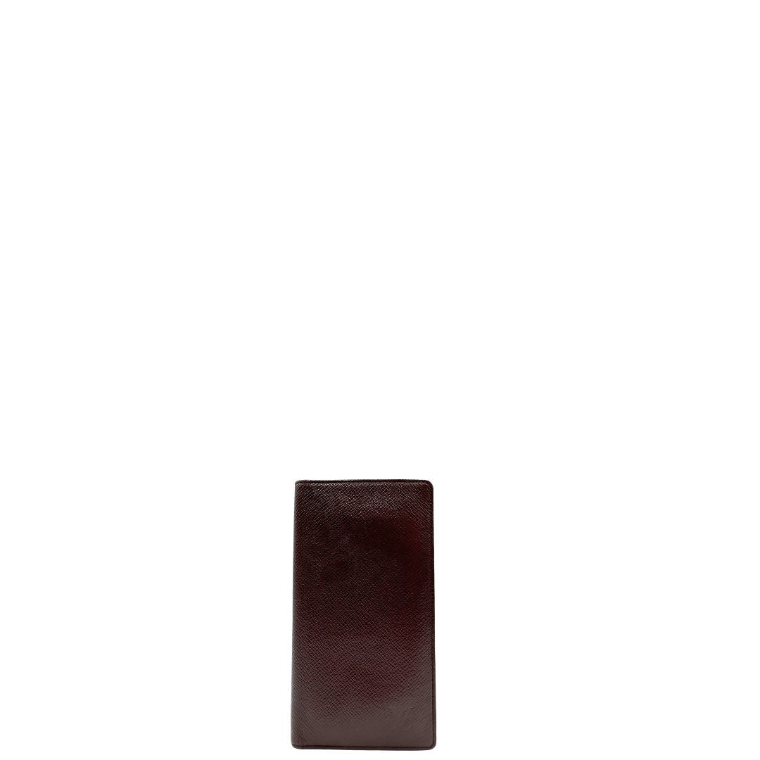 front  Portafoglio Louis Vuitton in pelle bordeaux. Completo di dustbag, di lusso, originale, ottime condizioni, usato. 
