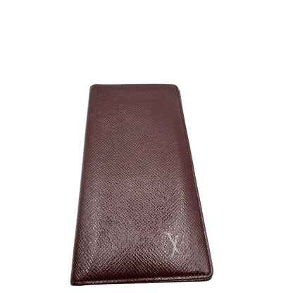 front  Portafoglio Louis Vuitton in pelle bordeaux. Completo di dustbag, di lusso, originale, ottime condizioni, usato. 