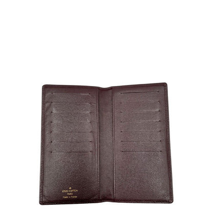 interno  Portafoglio Louis Vuitton in pelle bordeaux. Completo di dustbag, di lusso, originale, ottime condizioni, usato. 