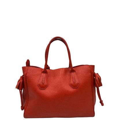 retro Borsa Longchamp in pelle martellata rosso corallo con parti metalliche dorate; munita di doppi manici, indossabile a spalla. Completa di dustbag, di lusso, originale, ottime condizioni. 