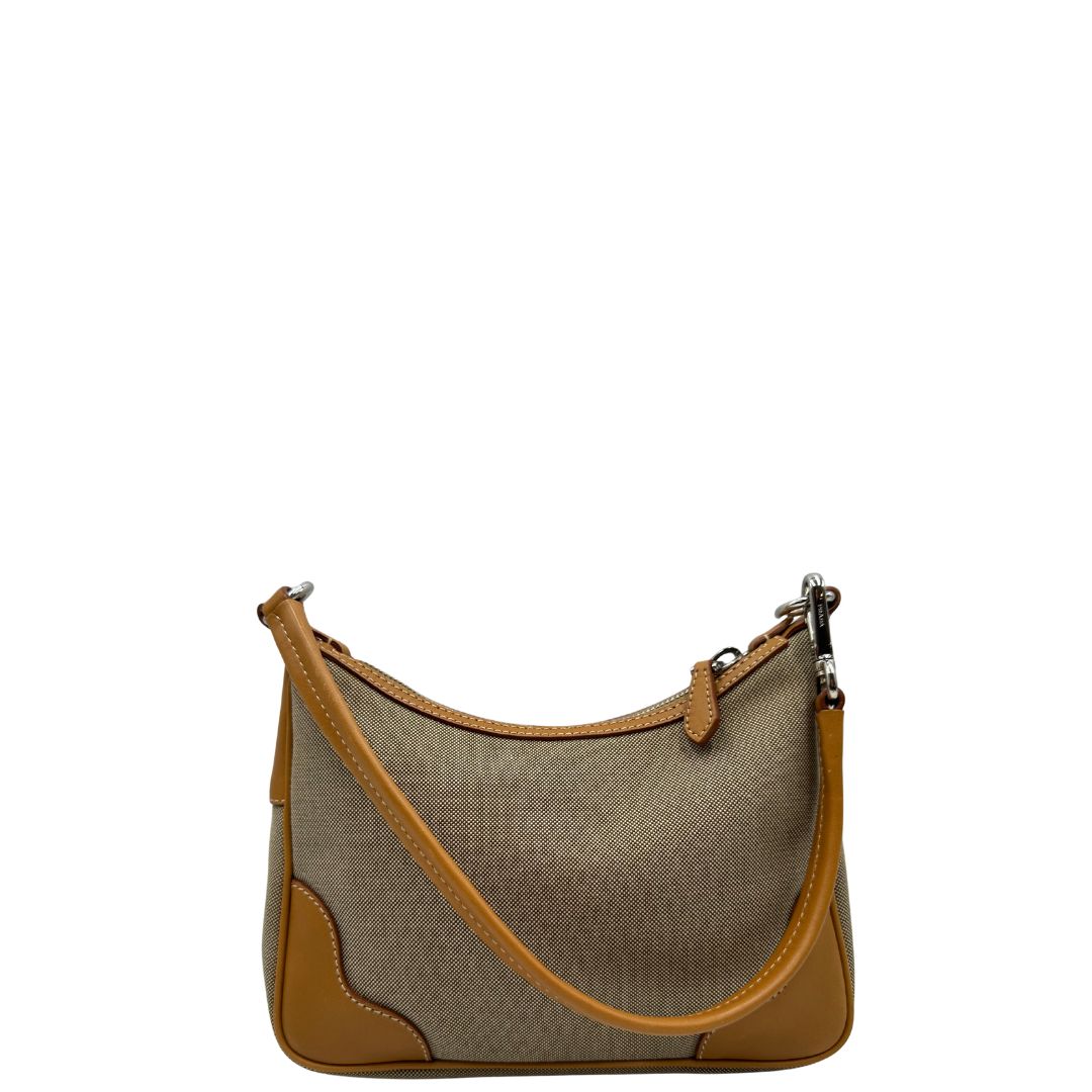 retro Borsa Prada in tessuto color corda con finiture in pelle marroni e parti metalliche argentate; munita di un manico singolo, di lusso, originale, ottime condizioni. 