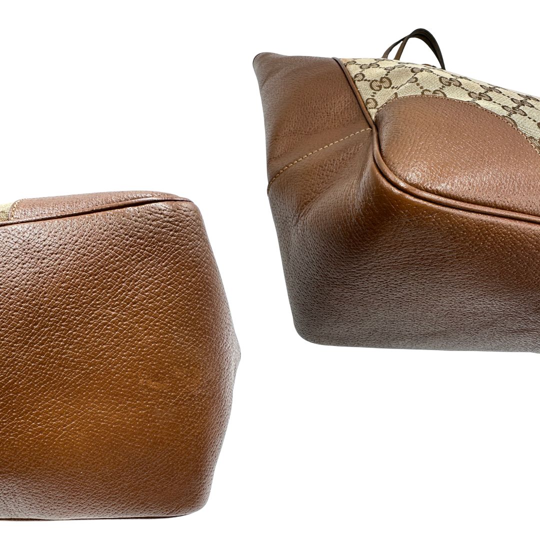 Borsa Gucci in tessuto GG con finiture in pelle marroni e parti metalliche dorate; munita di doppi manici, indossabile a spalla. Completa di dustbag, di lusso, buone condizioni,usata.
