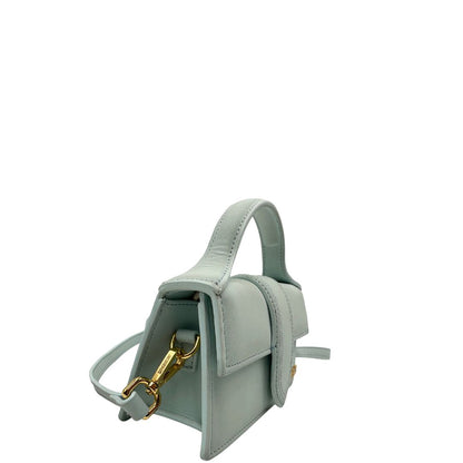 lato  Borsa Jacquemus nella versione Le Bambino, di lusso, originale, ottime condizioni, usata. 