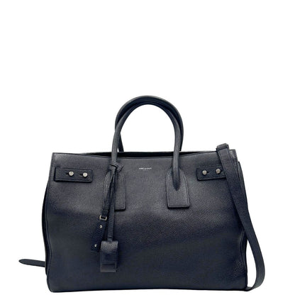 front  Borsa Saint Laurent in pelle martellata blu con parti metalliche argentate; munita di doppi manici stondati e una tracolla amovibile e regolabile, di lusso, originale, ottime condizioni, usata, originale.