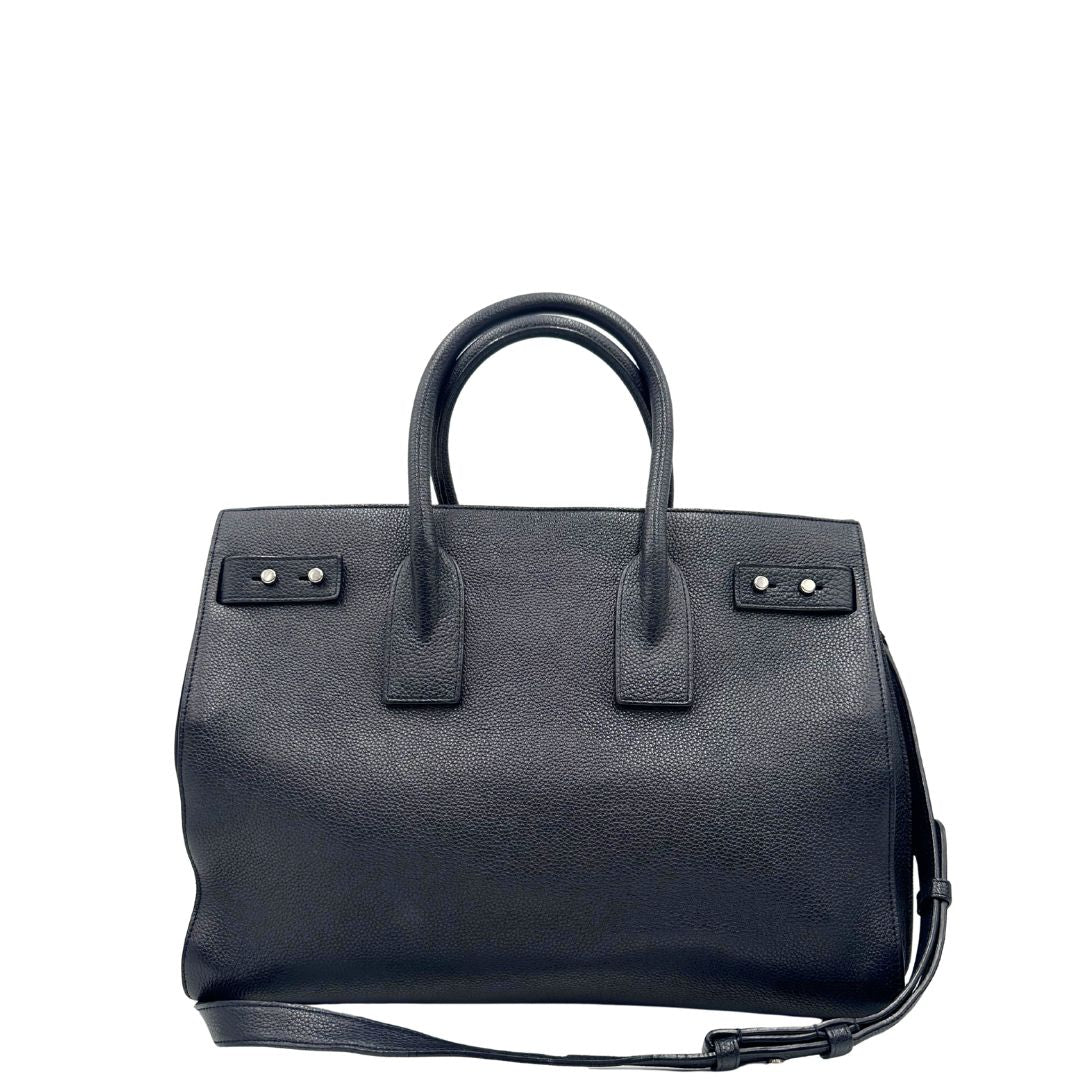 retro  Borsa Saint Laurent in pelle martellata blu con parti metalliche argentate; munita di doppi manici stondati e una tracolla amovibile e regolabile, di lusso, originale, ottime condizioni, usata, originale. 