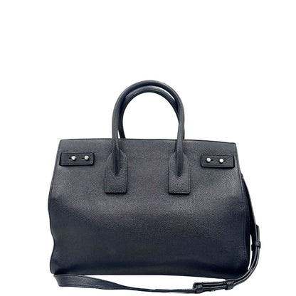 retro  Borsa Saint Laurent in pelle martellata blu con parti metalliche argentate; munita di doppi manici stondati e una tracolla amovibile e regolabile, di lusso, originale, ottime condizioni, usata, originale. 