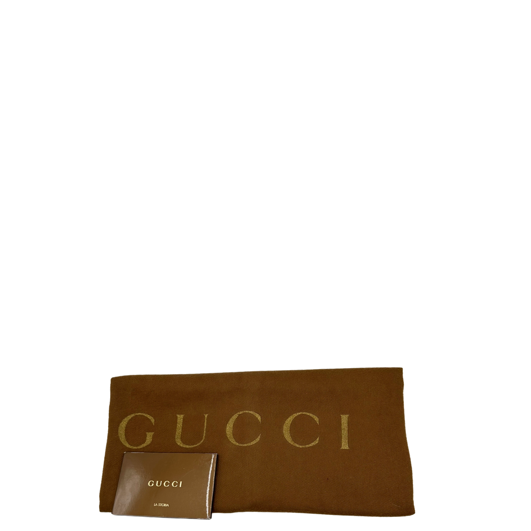 Dustbag di una Borsa Gucci in pelle bianco panna con metalleria in oro dorato e inserti in pelle avorio, munita di doppi manici in bamboo e tracolla amovibile. Completa di dutsbag. Originale, usata, di lusso, in ottime condizioni.