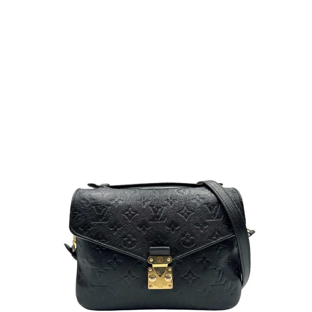 front Louis Vuitton Mètis in pelle monogram empreinte con hardware dorato, di lusso, originale, ottime condizioni, usata. 