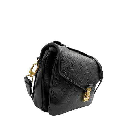 lato Louis Vuitton Mètis in pelle monogram empreinte con hardware dorato, di lusso, originale, ottime condizioni, usata. 