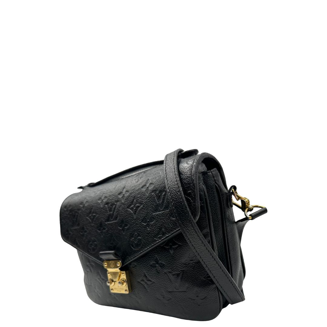 lato Louis Vuitton Mètis in pelle monogram empreinte con hardware dorato, di lusso, originale, ottime condizioni, usata. 