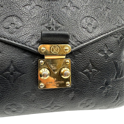 chiusura Louis Vuitton Mètis in pelle monogram empreinte con hardware dorato, di lusso, originale, ottime condizioni, usata. 