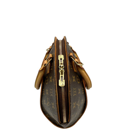 Borsa Louis Vuitton nella versione PM realizzata in tela monogram marrone con finiture in vacchetta naturale, di lusso, originale, usata, ottime condizioni. 