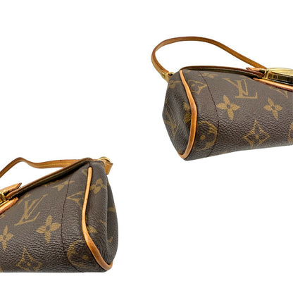 angoli  Borsa Beverly nella versione pochette realizzata in tela Monogram, di lusso, originale, ottime condizioni, usata. 