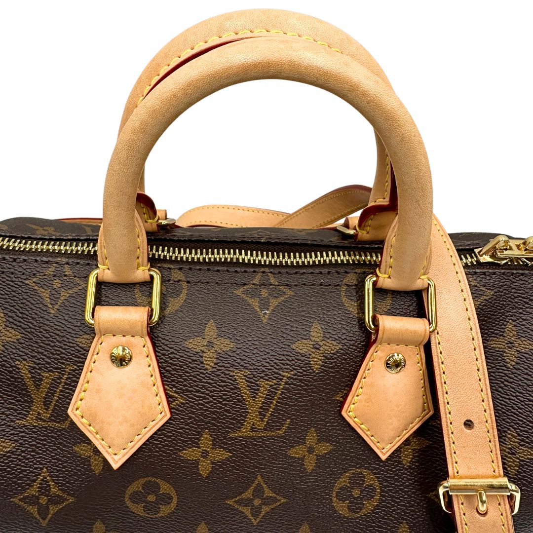 manici Borsa LV in canvas marrone monogram, con parti metalliche dorate, di lusso, originale, ottime condizioni, usata. 