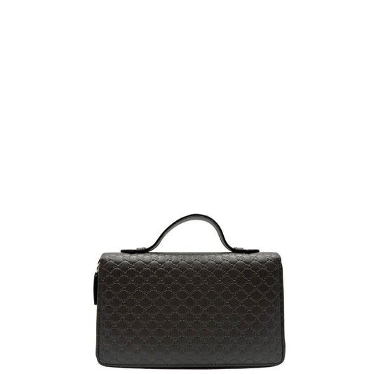 front  Pochette portadocumenti Gucci caratterizzata da numerosi scomparti, di lusso, originale, ottime condizioni, usato. 