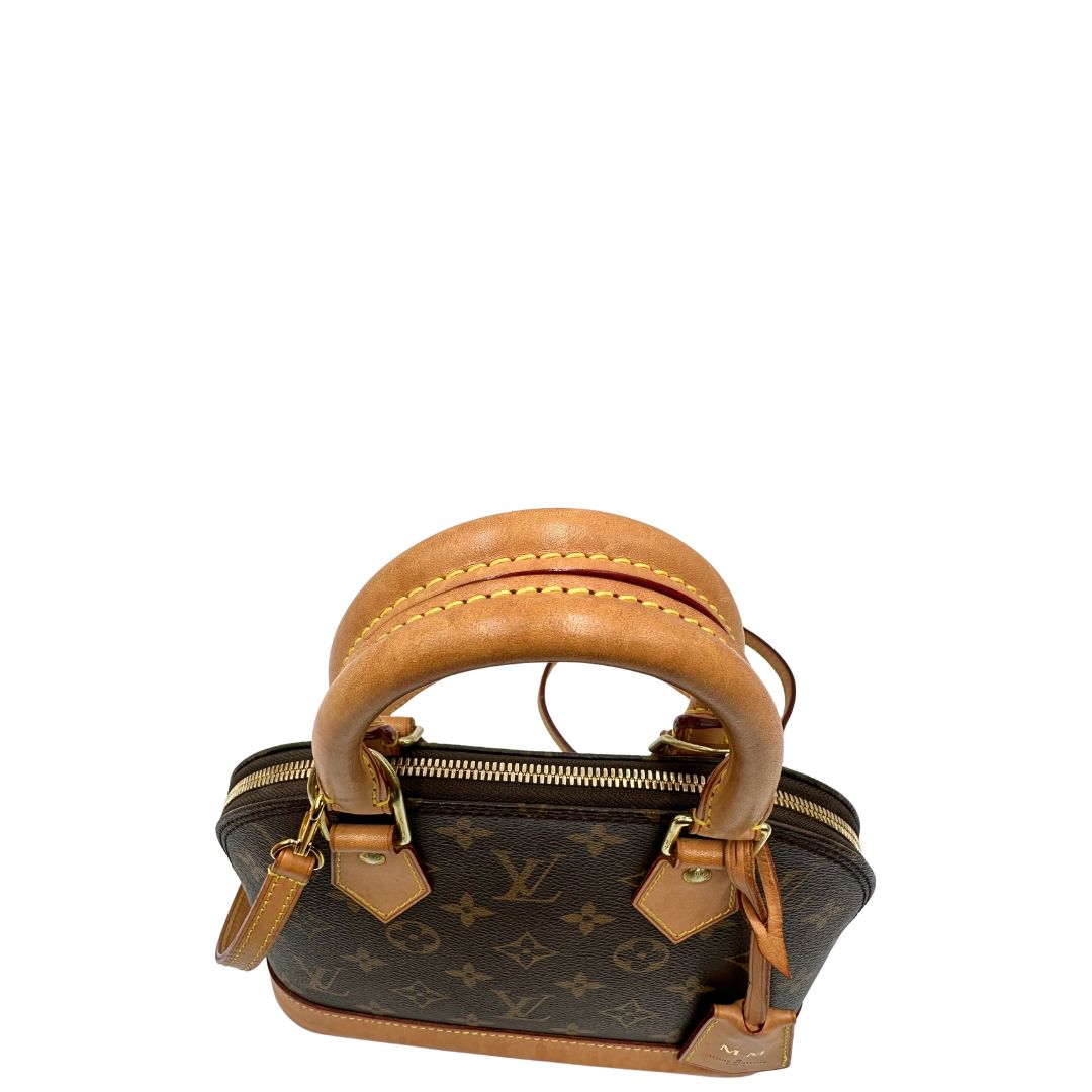 manici  Louis Vuitton Alma in tela monogram nella versione BB, di lusso, originale, ottime condizioni, usata. 
