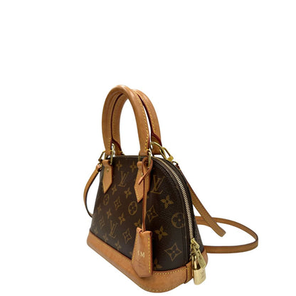 lato  Louis Vuitton Alma in tela monogram nella versione BB, di lusso, originale, ottime condizioni, usata. 