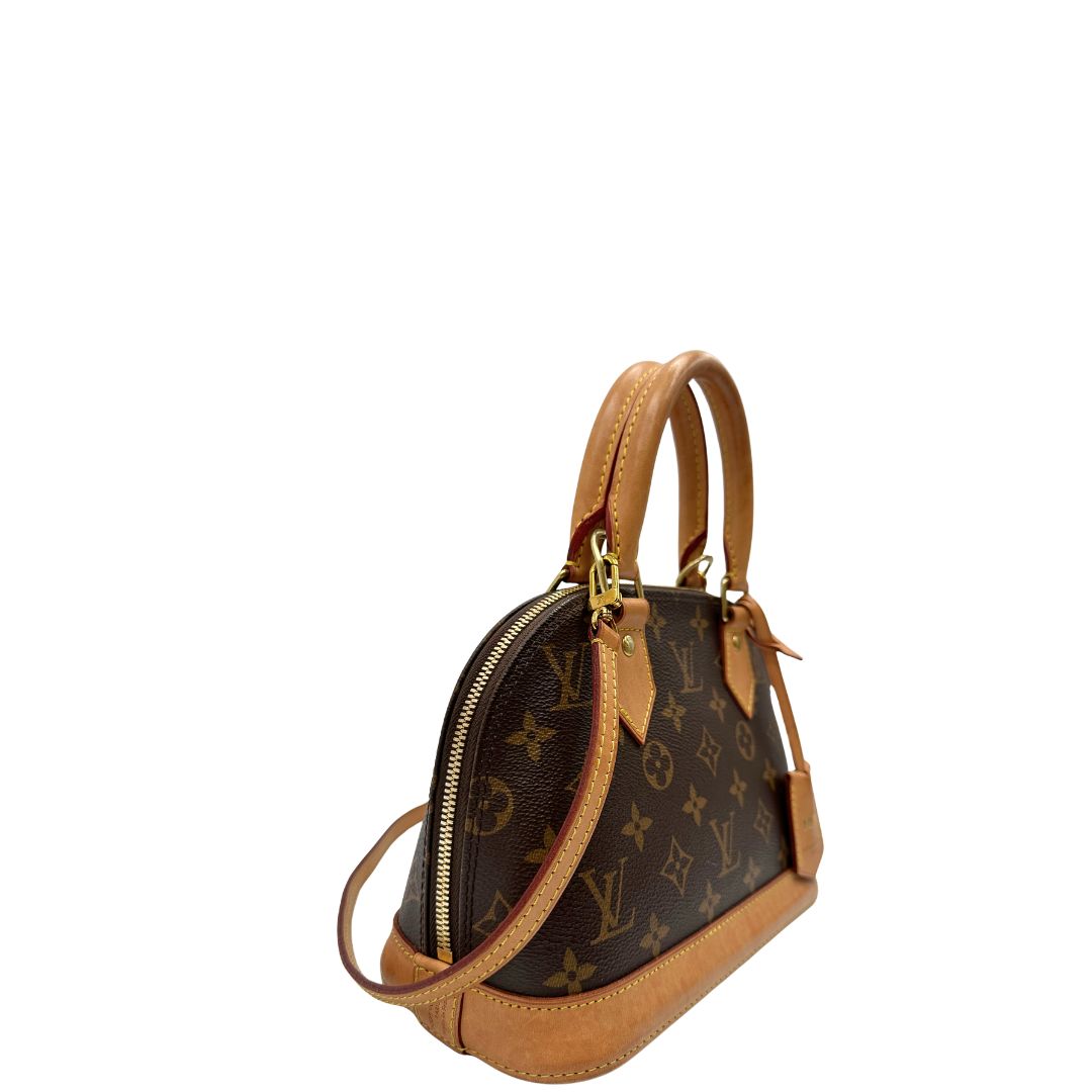 lato  Louis Vuitton Alma in tela monogram nella versione BB, di lusso, originale, ottime condizioni, usata. 