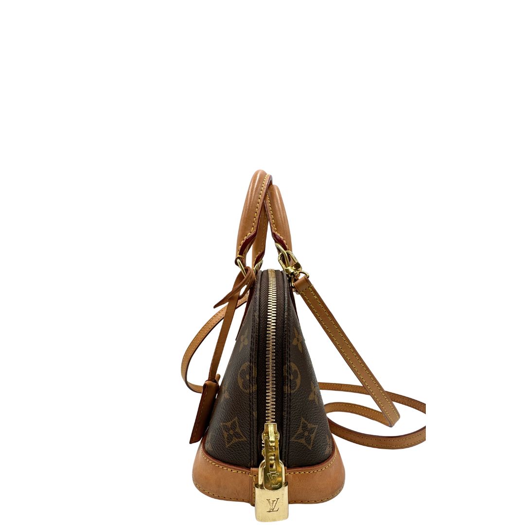 lato  Louis Vuitton Alma in tela monogram nella versione BB, di lusso, originale, ottime condizioni, usata. 