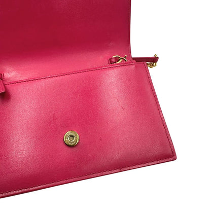 Borsa Kate di Saint Laurent in pelle fucsia, nella versione compatta wallet. Originale, usata, di lusso, in condizioni buone.