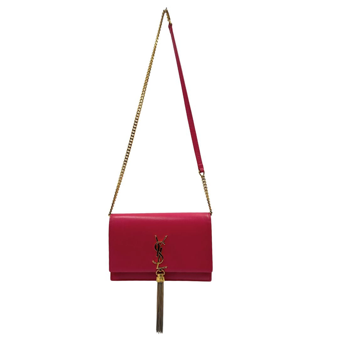 Front, Borsa Kate di Saint Laurent in pelle fucsia, nella versione compatta wallet. Originale, usata, di lusso, in condizioni buone.