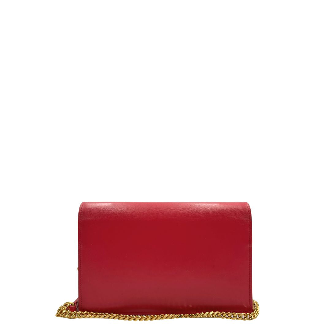 Retro, Borsa Kate di Saint Laurent in pelle fucsia, nella versione compatta wallet. Originale, usata, di lusso, in condizioni buone.