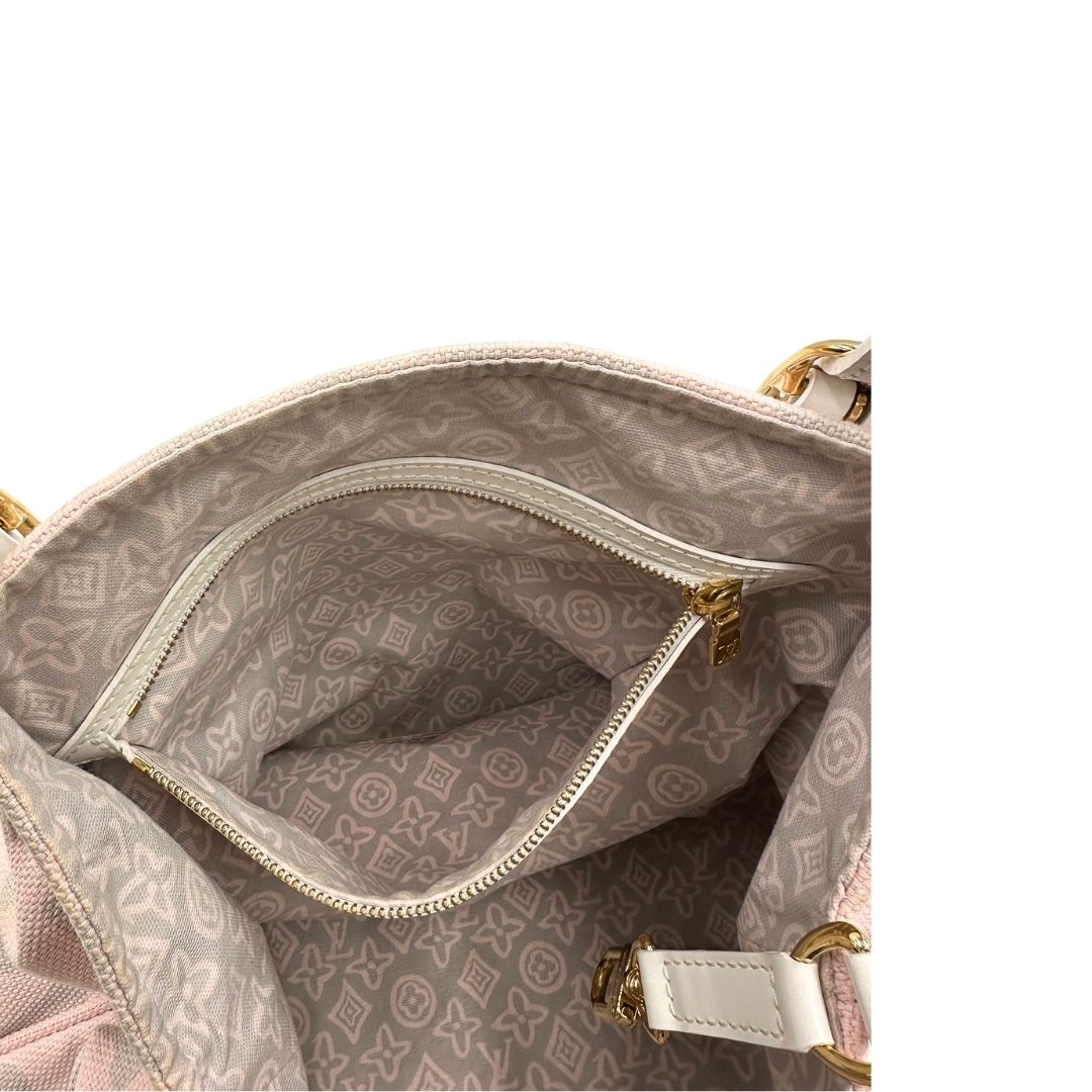 Tasca interna, Borsa Louis Vuitton in tela resistente bicolore con motivi floreali coordinati.