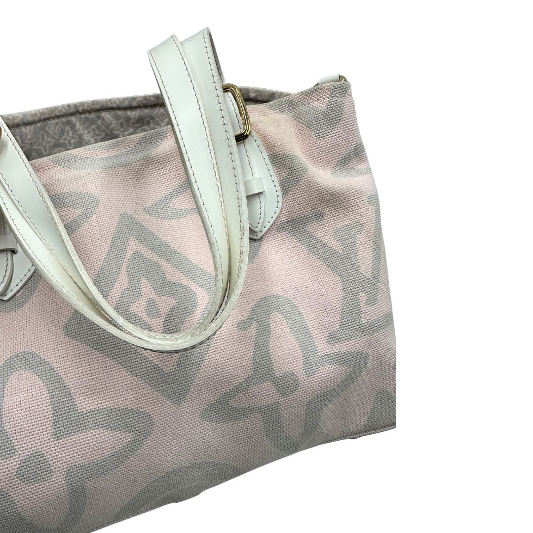 Manici, Borsa Louis Vuitton in tela resistente bicolore con motivi floreali coordinati.