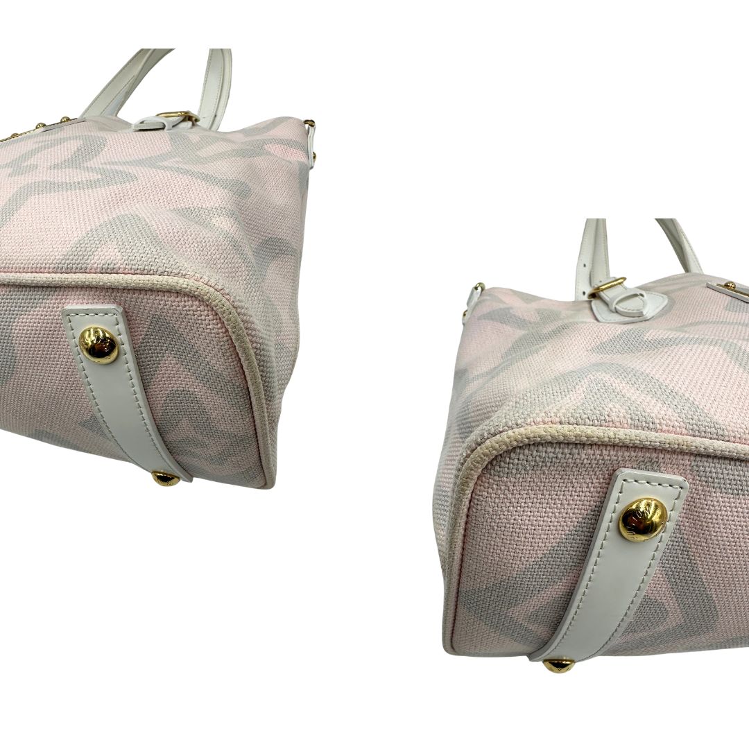 Angoli, Borsa Louis Vuitton in tela resistente bicolore con motivi floreali coordinati.