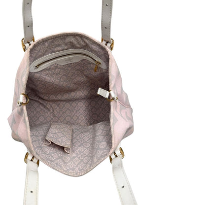 Interno, Borsa Louis Vuitton in tela resistente bicolore con motivi floreali coordinati.