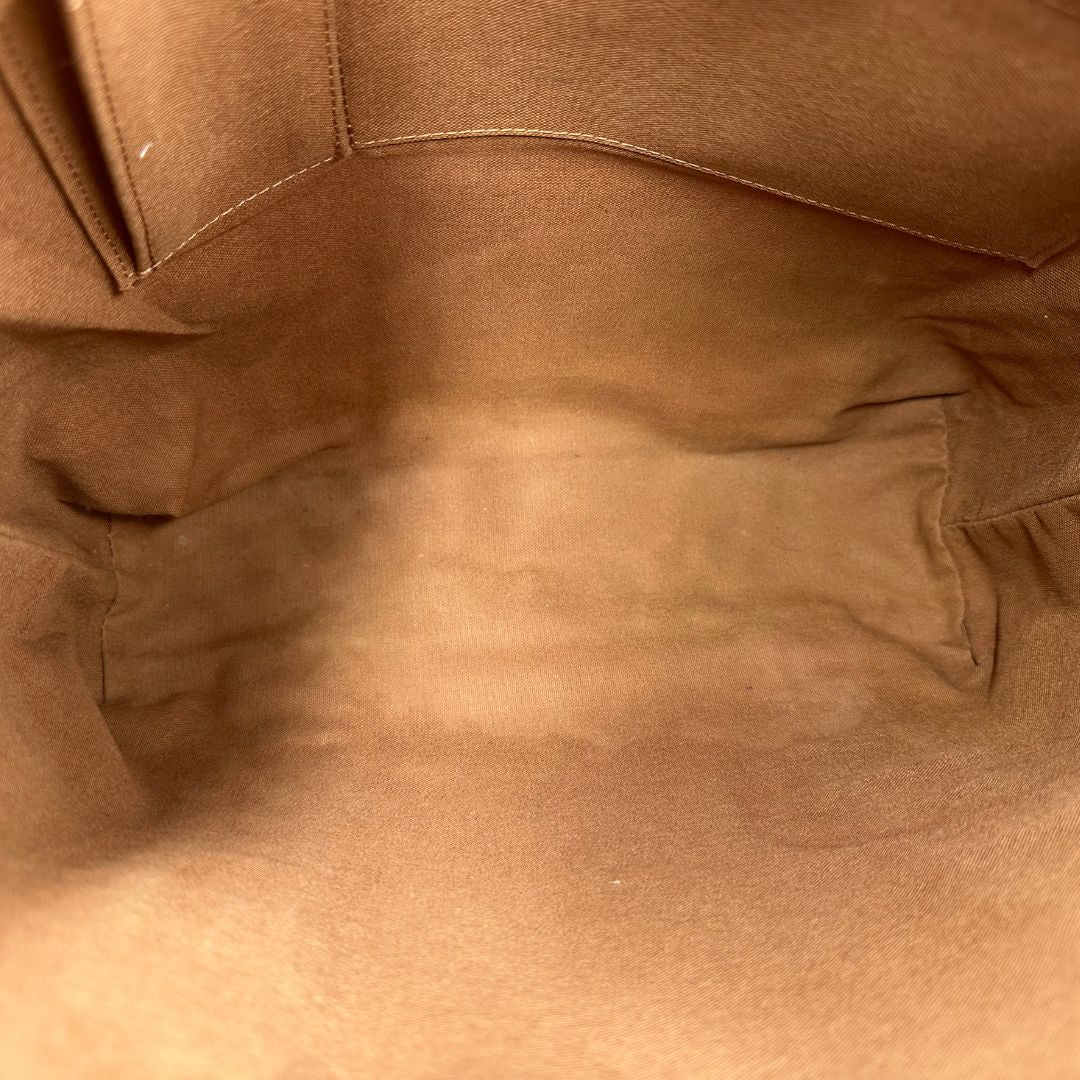 interno  Borsa Louis Vuitton realizzata in tela monogram marrone con finiture in vacchetta naturale e rifinita con parti in tessuto, di lusso, originale, ottime condizioni, usata. 