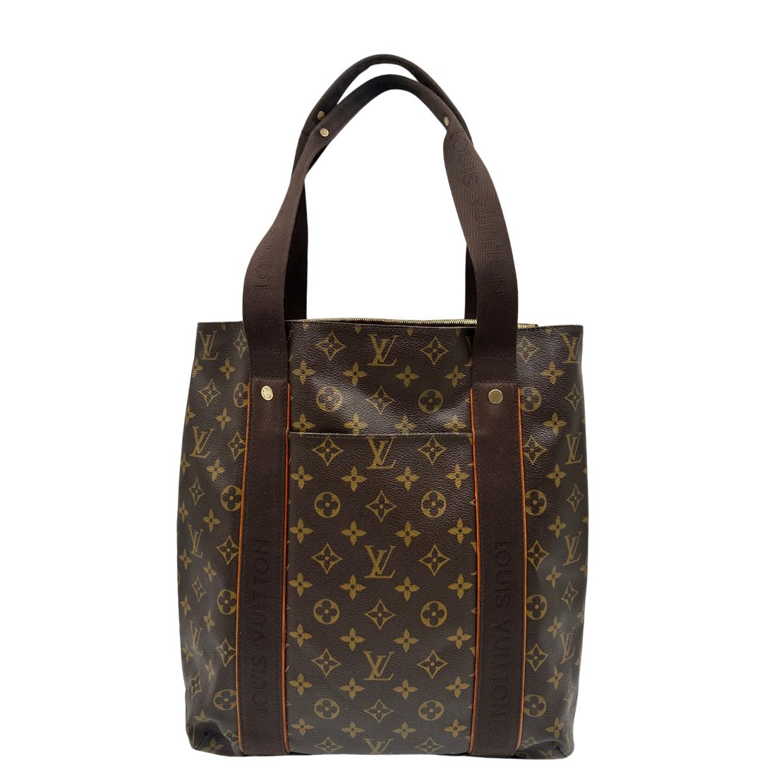 front  Borsa Louis Vuitton realizzata in tela monogram marrone con finiture in vacchetta naturale e rifinita con parti in tessuto, di lusso, originale, ottime condizioni, usata. 