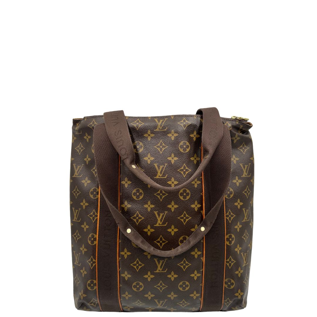 retro  Borsa Louis Vuitton realizzata in tela monogram marrone con finiture in vacchetta naturale e rifinita con parti in tessuto, di lusso, originale, ottime condizioni, usata. 