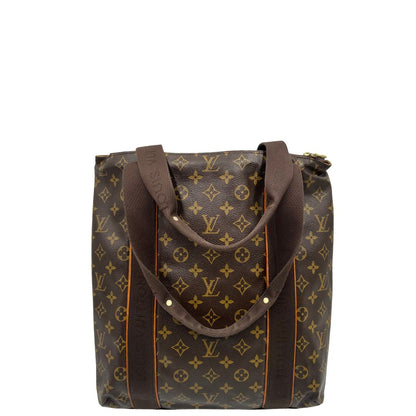 retro  Borsa Louis Vuitton realizzata in tela monogram marrone con finiture in vacchetta naturale e rifinita con parti in tessuto, di lusso, originale, ottime condizioni, usata. 