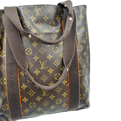 manici  Borsa Louis Vuitton realizzata in tela monogram marrone con finiture in vacchetta naturale e rifinita con parti in tessuto, di lusso, originale, ottime condizioni, usata. 