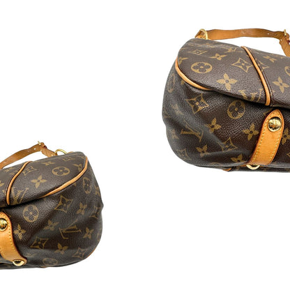 Angoli, Borsa Louis Vuitton realizzata in tela monogram marrone con finiture in vacchetta naturale.