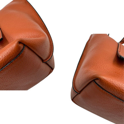 angoli Borsa Hogan nella nuance marrone cognac in pelle martellata 