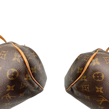 Angoli, Borsa Louis Vuitton Montorgueil realizzata in tela Monogram con hardware dorato.