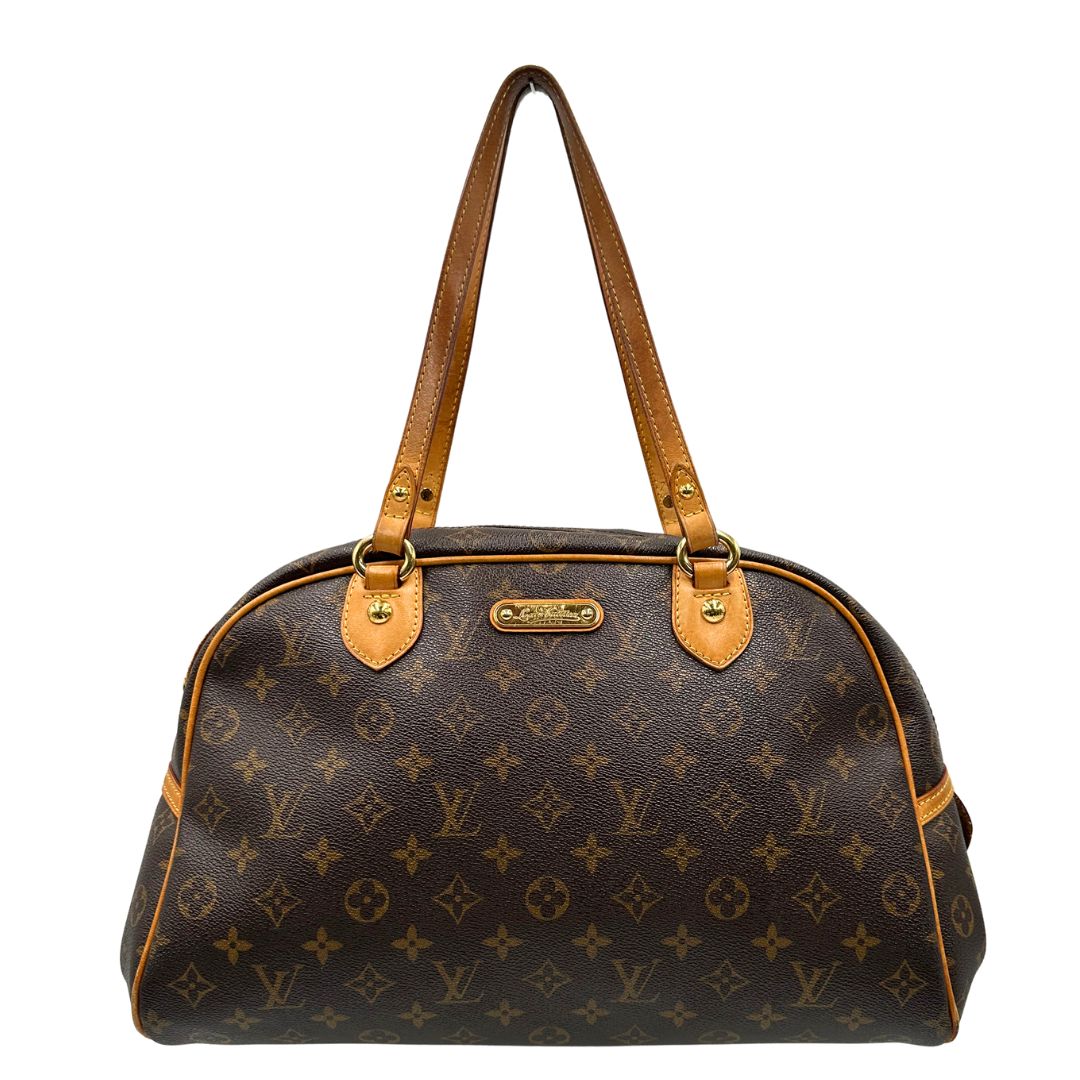 Front, Borsa Louis Vuitton Montorgueil realizzata in tela Monogram con hardware dorato.