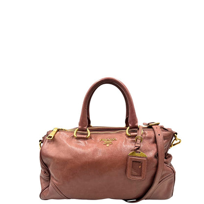 front Satchel Prada color rosa antico e hardware dorato, puoi portarla comodamente a tracolla o mano, di lusso, originale, usata, ottime condizioni. 