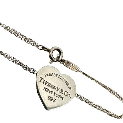 Bracciale Tiffany&Co. della collezione Return To Tiffany in argento 925 con ciondolo cuore, di lusso, originale, ottime condizioni.